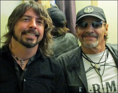 Hi, I'm a rock star wearing a baseball cap