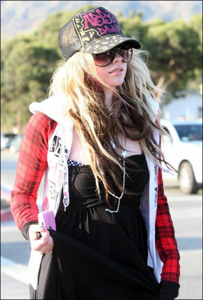 Hi, I'm a rock star wearing a baseball cap