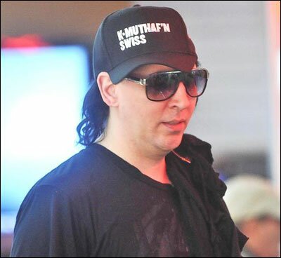 Hi, I'm a rock star wearing a baseball cap