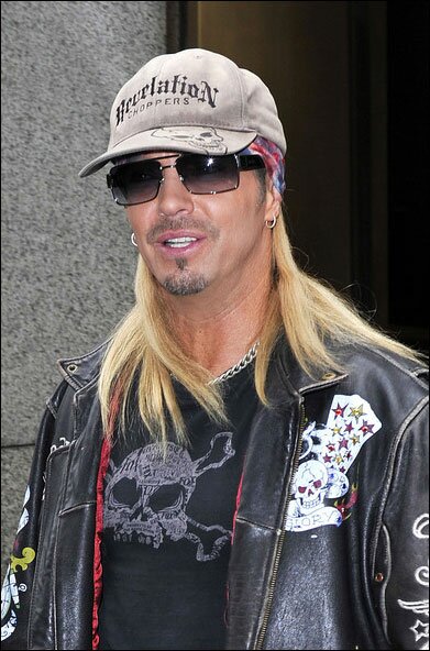 Hi, I'm a rock star wearing a baseball cap